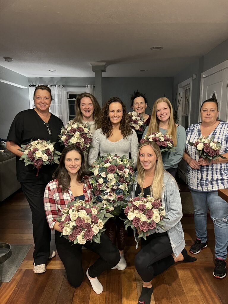 bride and bridesmaid with bouquets they made