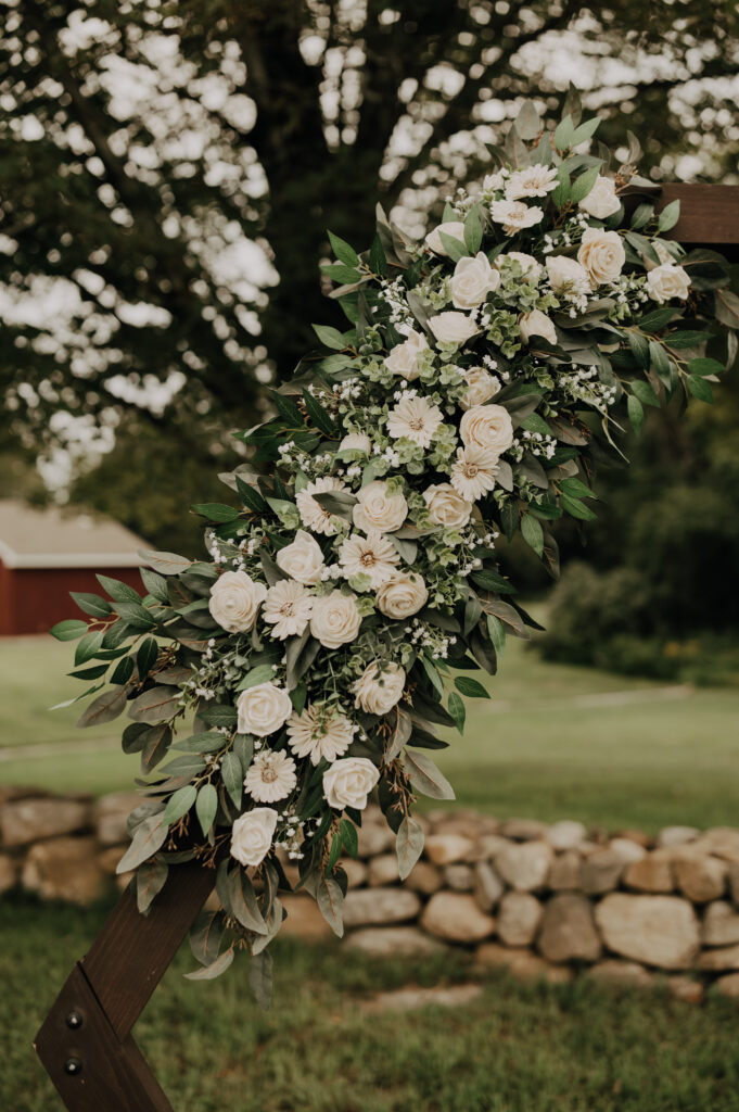 wood flower decor for a wedding arch