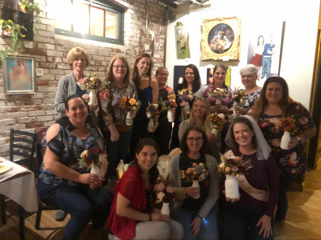 bachelorette party with a DIY wood flower arrangement workshop